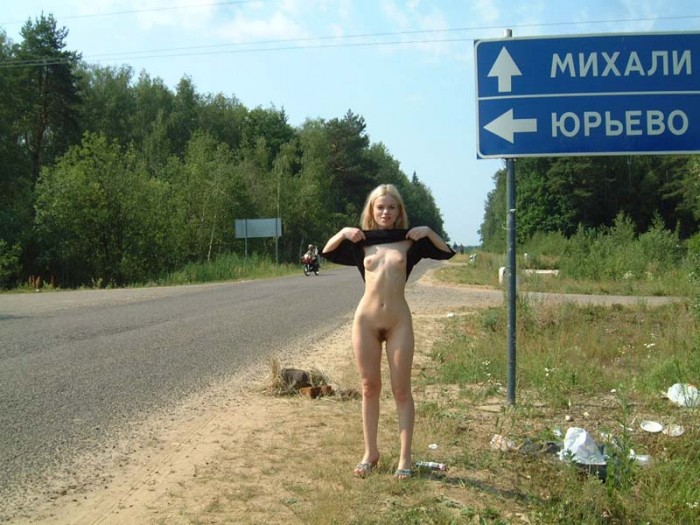 Skinny blonde with hairy pussy shows boobs at public.jpg