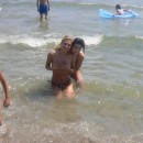 Curly blonde on the beach