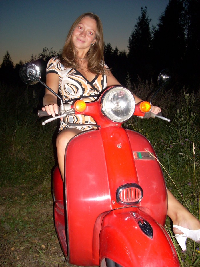 Vera on the bike at forest