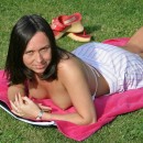 Sexy brunette likes to show herself outdoors