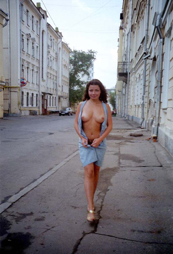 Nice girl walks naked on Moscow street during the USSR