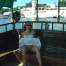 Lovely girl posing naked on boat