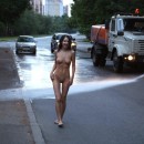 Russian teen brunette with sporty body walks naked