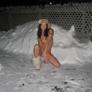 Sporty brunette posing at winter