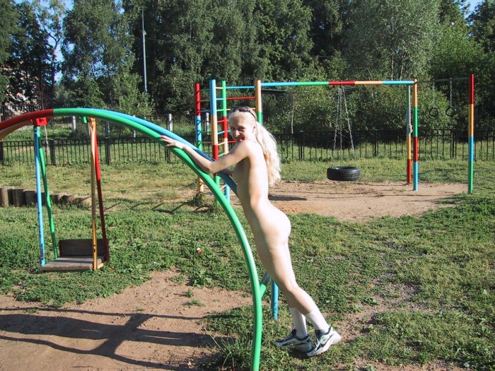 Sporty russian girl posing naked at public