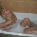 Nice shy blonde with sweet boobs posing at bath
