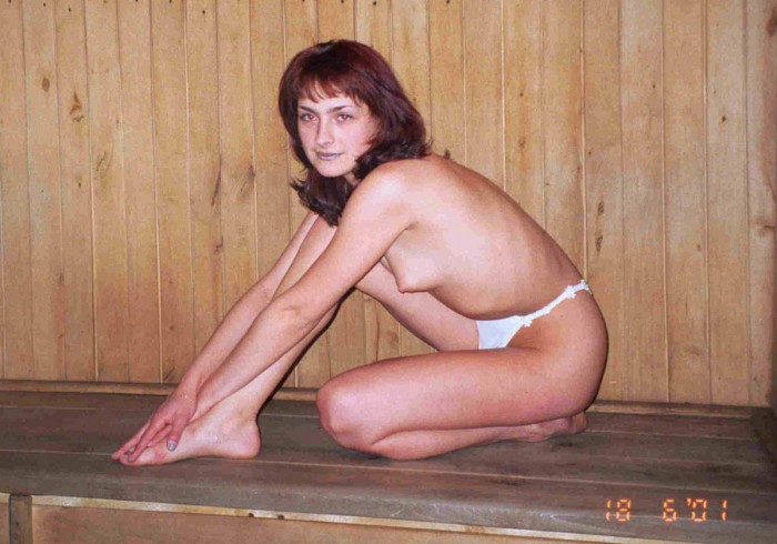 Redhead wife posing naked at sauna and outdoors