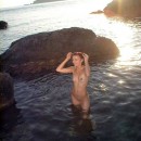 Lovely russian girl with small tits posing naked at nudist beach
