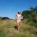 Amazing amateur sporty teen posing topless outdoors