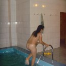 Sexy russian teen girl with long hairs and big boobs posing at sauna