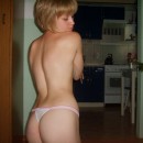 Shorthair russian blonde girl posing at home