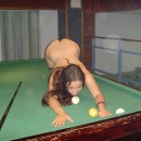 Beautiful russian teen with sweet body posing naked on billiard table
