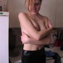 Sporty amateur blonde with hairy pussy at kitchen