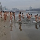 Big group of russian nudists swiming and posing at beach