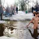 Big group of russian nudists swimming naked at winter