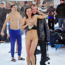 Big group of russian nudists swimming naked at winter