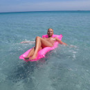 Busty russian blonde on vacation sunbathing