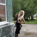 Lovely russian blonde flashes ass, boobs and shaved pussy at public
