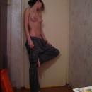 Lovely russian teen with skinny body posing topless at home