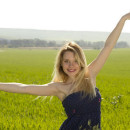 Blonde with sporty body outdoors