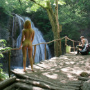 Sexy redhead posing naked at public park