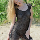 Very sweet russian teen in transparent dress at beach