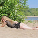 Very sweet russian teen in transparent dress at beach