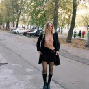 Blonde girl flashes naked body at public streets
