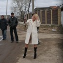 Russian blonde slut demonstrates her sporty body to strangers