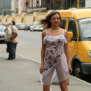 Russian chick flashes her body at a place with many people