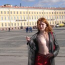 Russian redhead teen flashes her young tits at public places