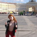 Russian redhead teen flashes her young tits at public places