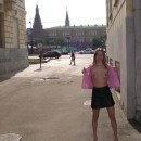 Sporty russian blonde shows her naked body at center of Moscow