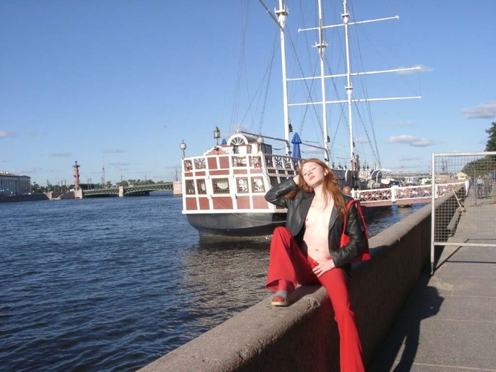 Very sweet redhead teen shows her goods at public boat