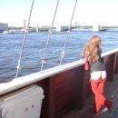 Very sweet redhead teen shows her goods at public boat