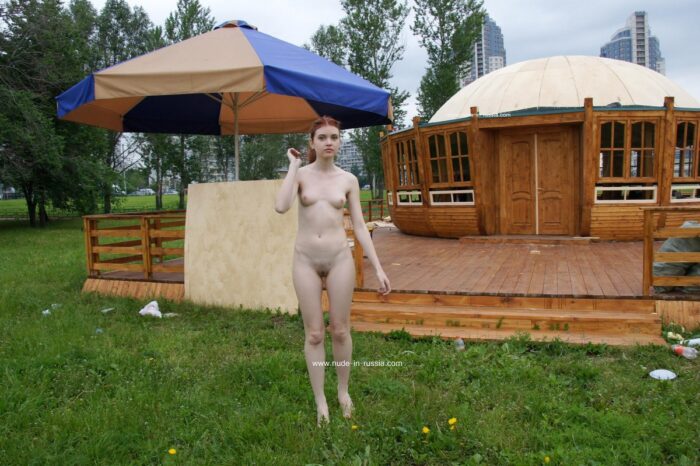 Redhead russian teen walks naked cafe under construction