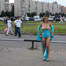 Busty blonde in blue dress flashes boobs and pussy