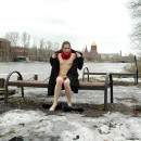 Lovely girl with small tits and hairy pussy posing at pier at winter