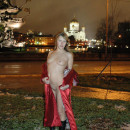 Russian girl with very small tits flashes her body at center of Moscow at winter