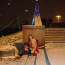 Russian girl with very small tits flashes her body at center of Moscow at winter