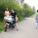 After a motorcycle trip she decided to show herself for two strangers