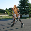 Russian blonde with perfect boobs on roller skates in very public place