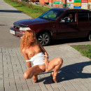 Sporty redhead teen with nice tits and shaved pussy at public