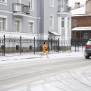 Russian brunette exhibitionist walks naked at public street at winter