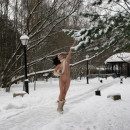 This sweet girl really loves walks naked at winter