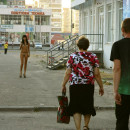 Brunette teen walks totally naked at peak hour