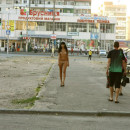 Brunette teen walks totally naked at peak hour