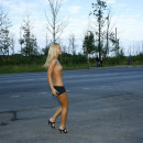 Hot blonde upskirt at highway in front of bus station