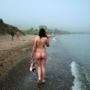 Girl with very hairy pussy on the beach