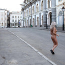 Russian girl with white hair walking in the morning the city
